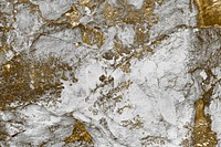 Gray seaside rock with gold glitter texture background