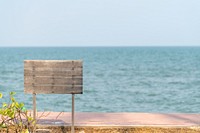 Blank wooden plank by the beach