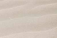 Natural pink sand on the beach background