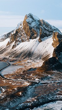Drone view of a snow covered Eystrahorn mountain in Iceland