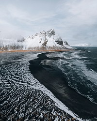 Beautiful black sand beach in winter at Vestrahorn in Iceland