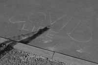 COVID life phrase written on the street
