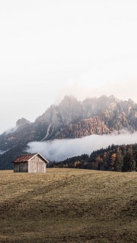 Wooden cabin in the hills near the Dolomites, Italy