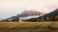 Wooden cabin in the hills near the Dolomites, Italy
