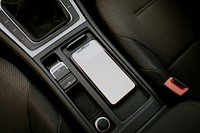 Blank screen mobile phone inside a car