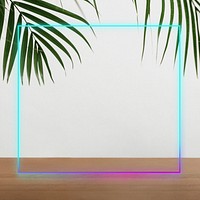 Neon frame with palm leaves by the wall