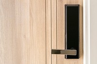 Digital lock pad security system on a wooden door