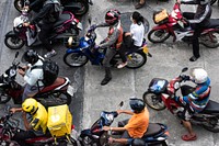 Motorcycles in Bangkok traffic aerial view. BANGKOK, THAILAND, 16 APRIL 2021