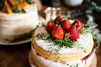 Layered cake with fresh cream and strawberries