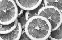 Black and white closeup of lemon textured background
