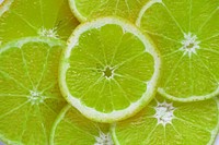 Closeup of sliced lime textured background
