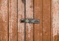 Wooden door with a latch