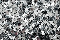 Shiny silver stars glitter festive background