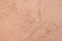 Close up of an orange rough wall texture