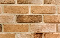 Brown brick wall textured wallpaper