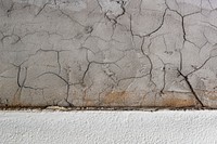 Cracked cement wall textured background