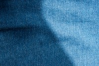 Wavy blue denim fabric textured background