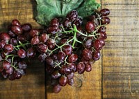 Fresh grapes on a wooden table