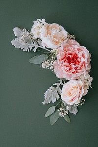 Pastel flower bouquet on green background