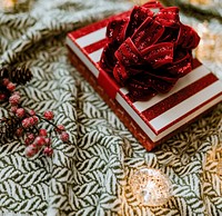 Christmas themed gift box with a poinsettia