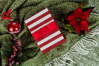 Christmas themed gift box with a poinsettia