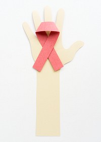 Paper craft of hand with pink ribbon
