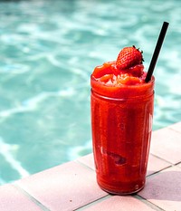Strawberry smoothie by the swimming pool