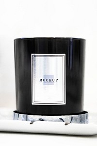 Close up of black candle mockup on white background