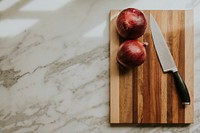 Fresh onion on a wooden cutting board