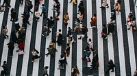 Pedestrians crossing a crosswalk in Shibuya, Japan