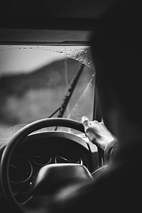 Man driving on a rainy day