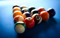 Billiard balls on a blue table