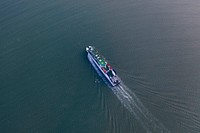 Container ship cruising on a sea drone shot