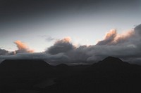 Cloudy sky over a mountain range