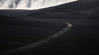 Curve road with a misty volcanic drone shot