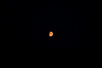 Red moon in a night sky