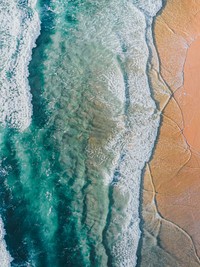 Drone view of the beautiful beach with crystal clear water