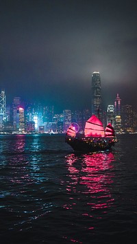 Travel mobile wallpaper background, Junk ship sailing in a Victoria Harbor, Hong Kong