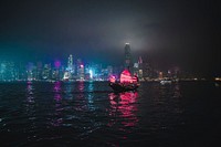 Junk ship sailing in a Victoria Harbor, Hong Kong