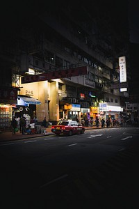 Taxi in Hong Kong at night. 10 MARCH, 2019 - HONG KONG