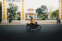 Vietnamese woman riding a motorbike. 26 FEBRUARY, 2019 - HANOI, VIETNAM
