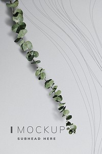 Poster mockup with eucalyptus leaves