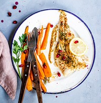 White fish with roasted vegetables and pomegranate food photography recipe idea