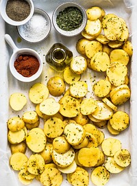 Sliced roasted potatoes on a tray