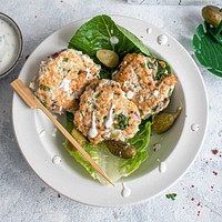 Freshly baked turkey cakes with cornichons classic