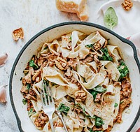 Homemade pappardelle pasta with mushrooms