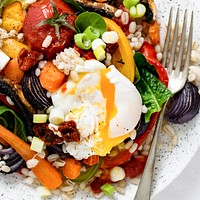 Barley with roasted vegetables and poached egg food photography