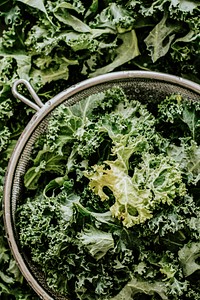 Fresh kale on a strainer food photography