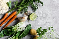 Various fresh organic vegetables on a gray kitchen top