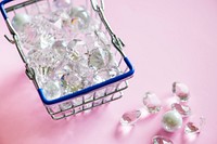 Glass diamonds in a shopping basket